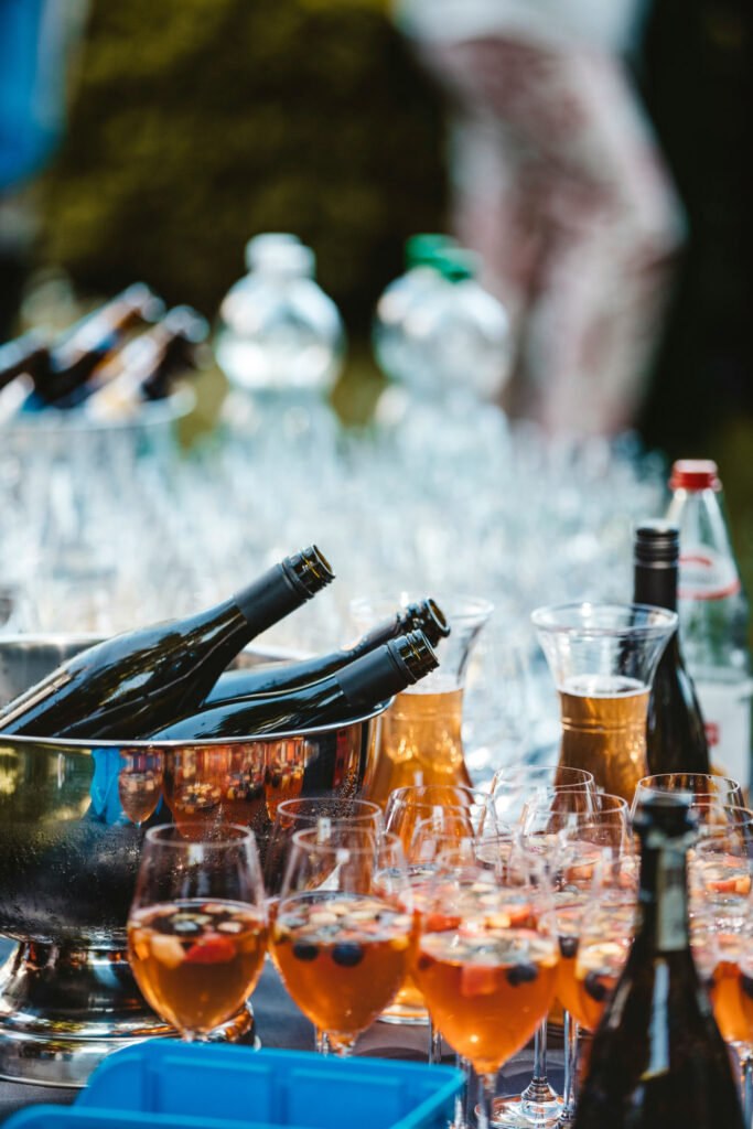 Fruit-filled drinks and wine bottles prepared for guests